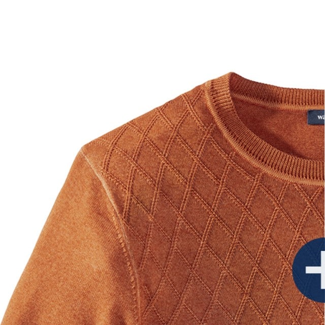 Detailaufnahme eines orangefarbenen Pullovers mit Rautensteppung.