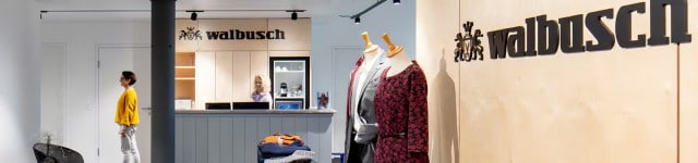 Sie sehen hier den hochwertig eingerichtetn Showroom in der Schweiz. Hier können Sie sich von Walbusch Kleidung inspirieren lassen.