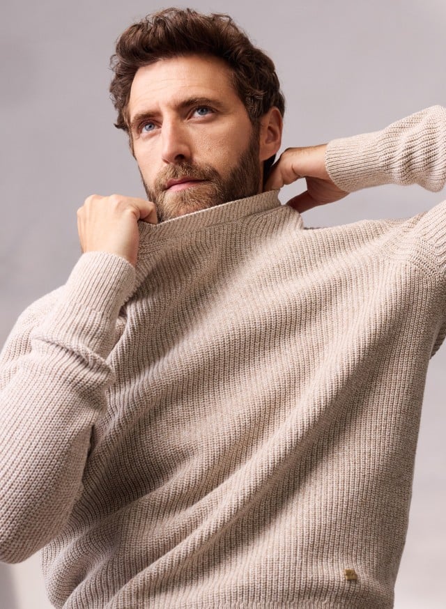 Abbildung Oberkörper Herr in Pullover