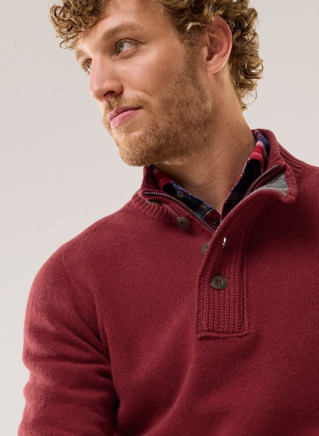 Abbildung Oberkörper Herr in Pullover