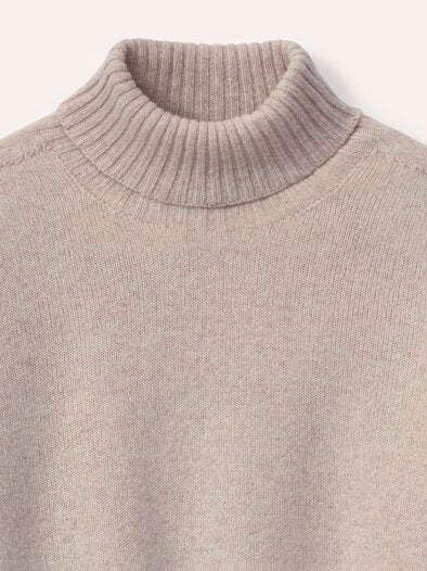 Rollkragenpullover aus Lammwolle Wollweiß