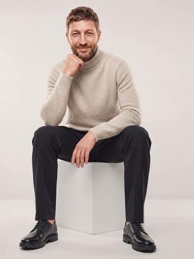 Rollkragenpullover aus Lammwolle Wollweiß