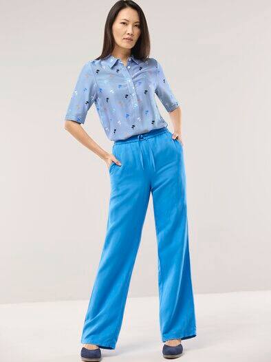 Polo Bluse aus Viskose Palmendruck