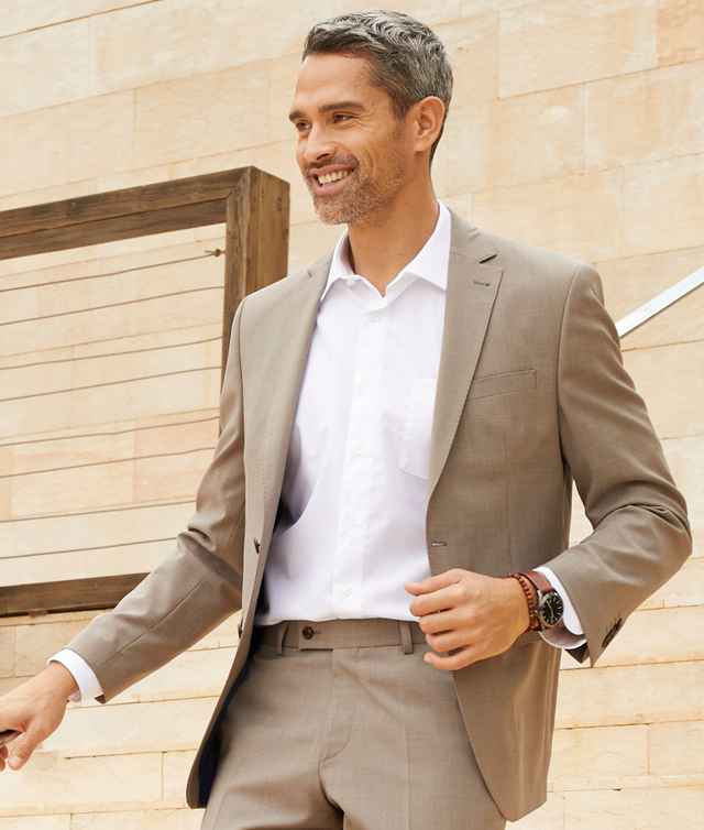 Mann in einem eleganten Anzug.